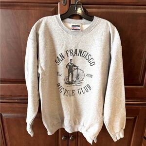 Medium (38-40) grey crew neck sweatshirt.